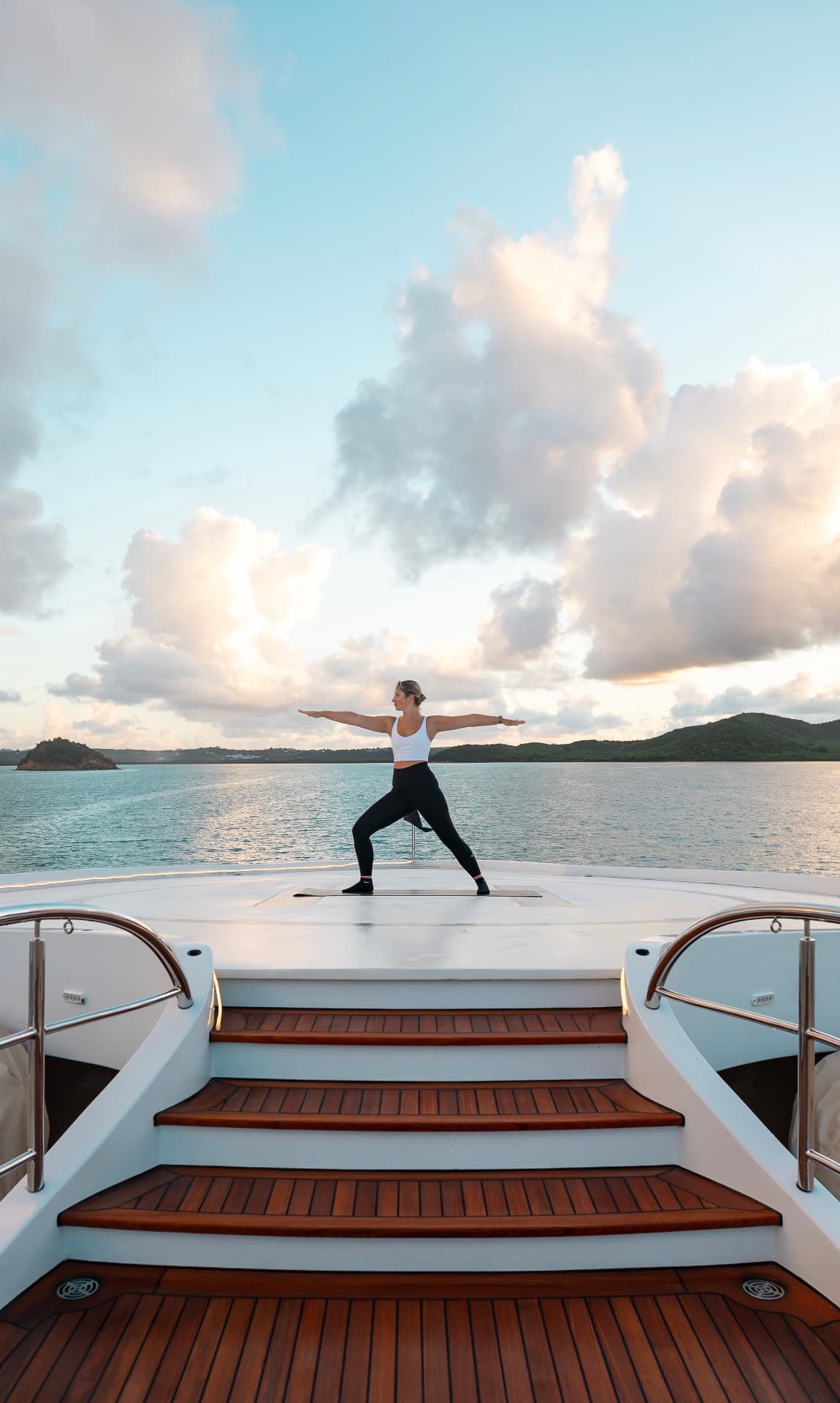 Yoga on a boat at sunset